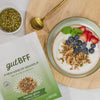 Three rotating images in a video displaying Honey Glow granola in a yogurt bowl, Cinnamon Apple Raisin granola with fruit in a glass bowl, and a variety pack featuring Honey Glow, Cinnamon Apple Raisin, and Chocolate Peanut Butter flavors.